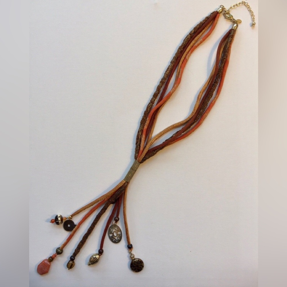 Necklace Fabric, metals and beads.